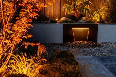 Architectural outdoor lighting to bring your garden to life at night.